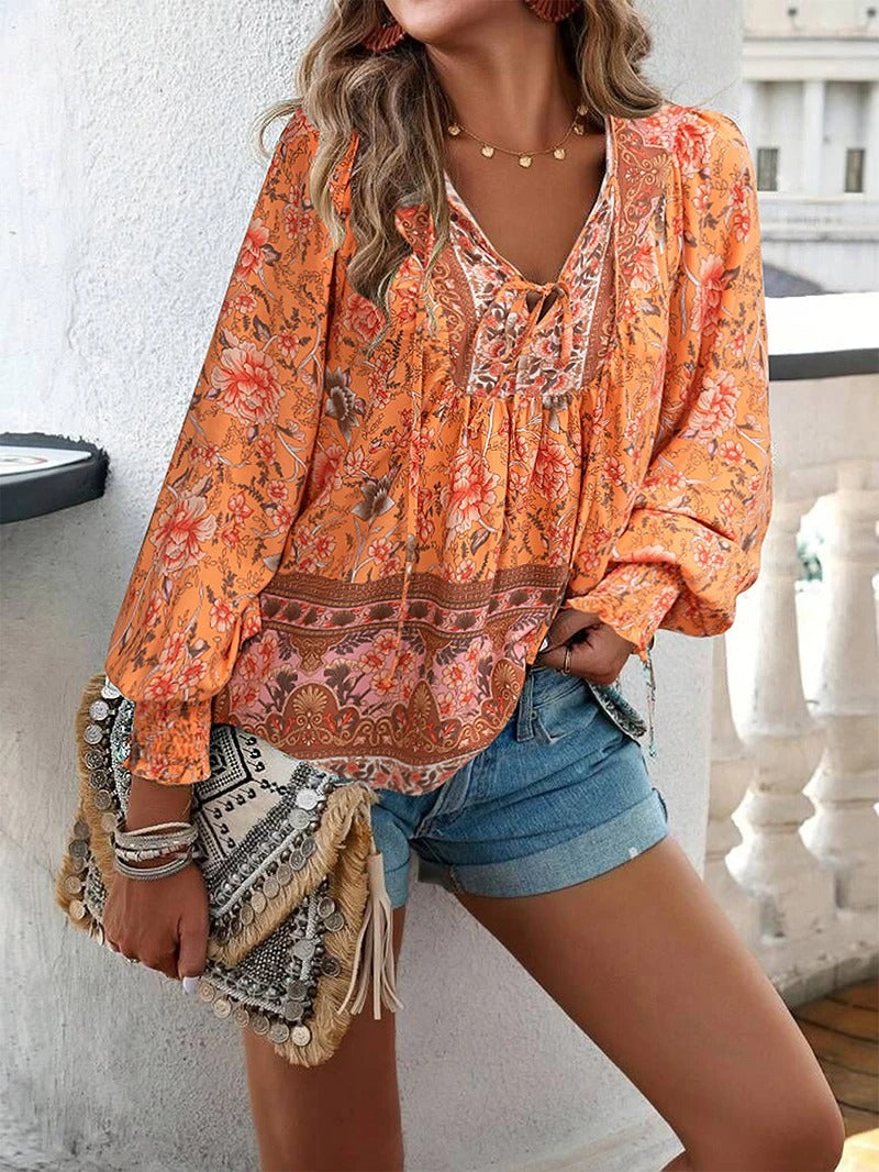 Arya™ | Elegant floral blouse with pleated cuffs