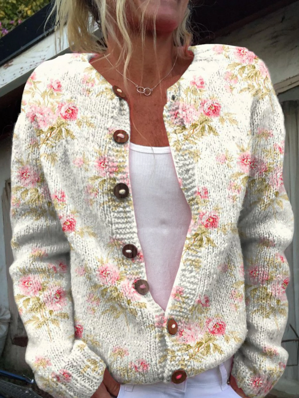 Gilet boutonné imprimé de fleurs roses fraîches et de feuilles vertes