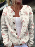 Gilet boutonné à imprimé de roses roses