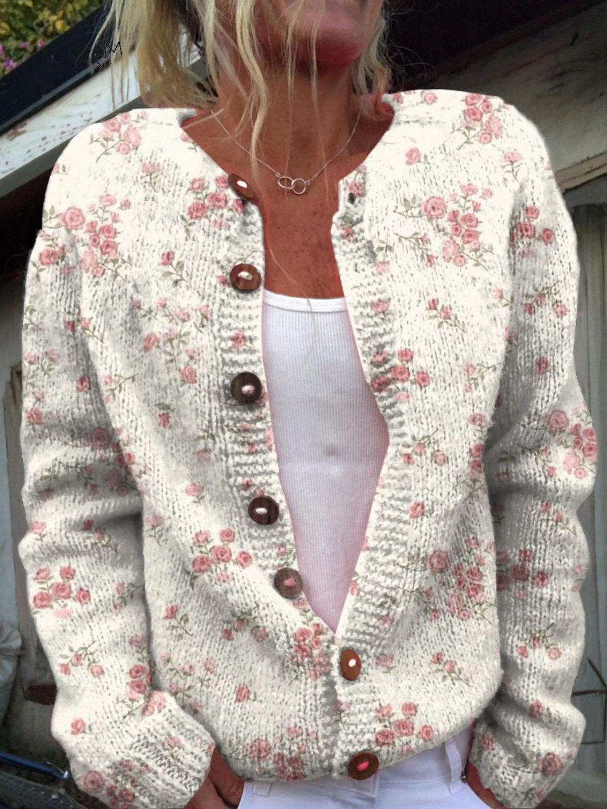 Gilet boutonné à imprimé de roses roses