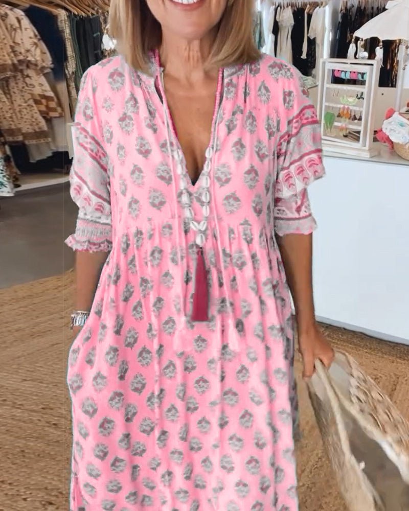 Mana | Robe chic à fleurs et col en V 