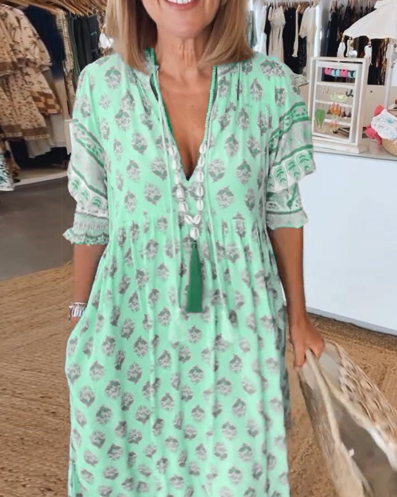 Mana | Robe chic à fleurs et col en V 