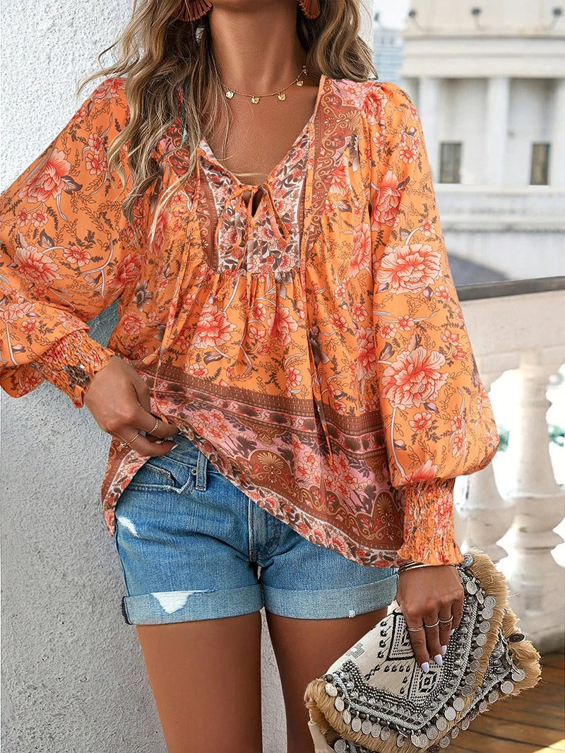 Arya™ | Elegant floral blouse with pleated cuffs