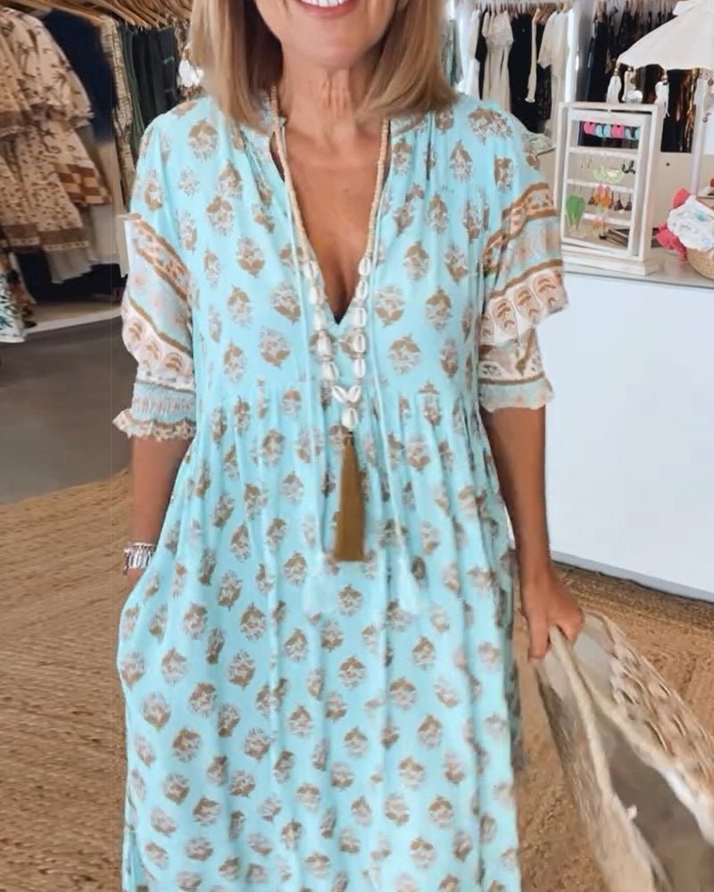Mana | Robe chic à fleurs et col en V 