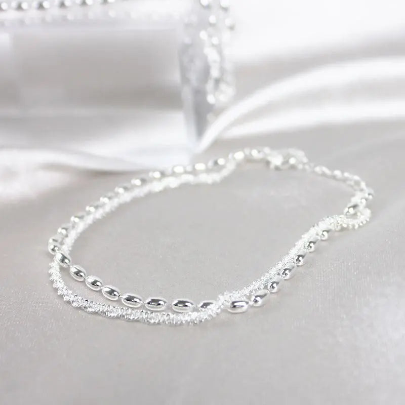Bracelet élégant en argent serti de pierres de zircone
