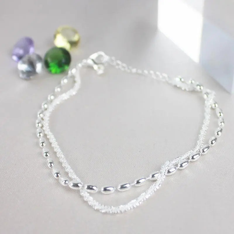 Bracelet élégant en argent serti de pierres de zircone
