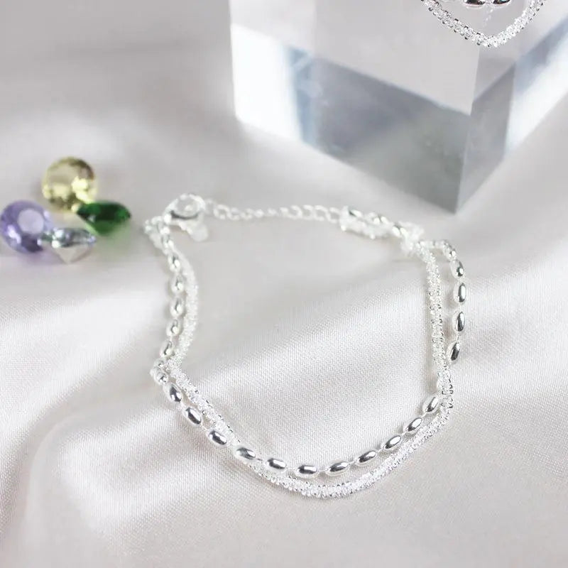 Bracelet élégant en argent serti de pierres de zircone