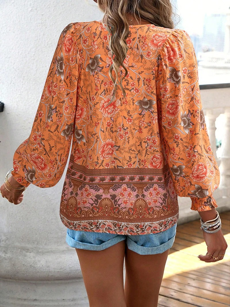 Arya™ | Elegant floral blouse with pleated cuffs