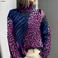 Audrey | Pull violet à motifs animaux abstraits